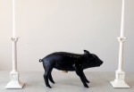 Bank in the Form of a Pig, $190; Grans Candlestick, $45 each